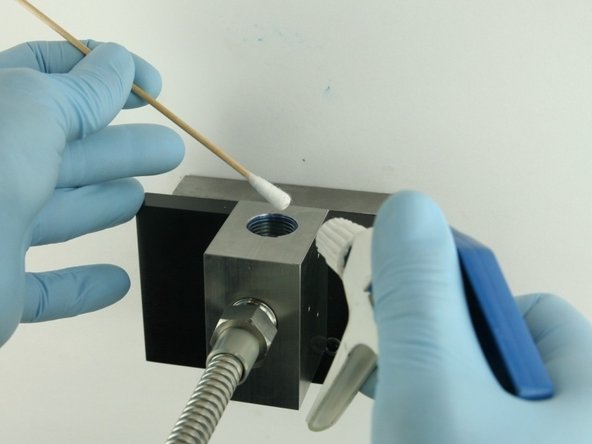 Thoroughly clean the interior of the  valve body with isopropyl alcohol or a similar cleaning agent before replacing the components.