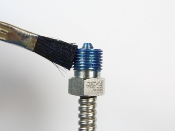 Apply Blue Goop to the threads of the gland nut.