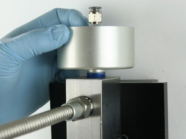 Unthread the actuator from the valve body.