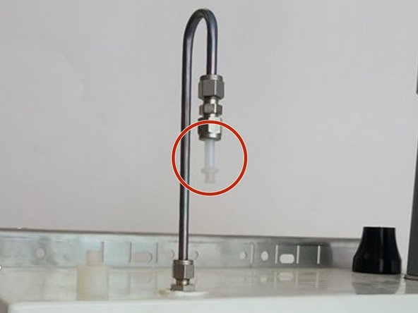 Attach the inlet flow adaptor.