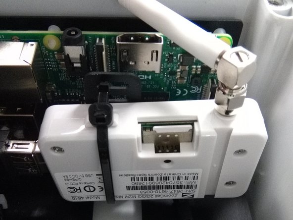 Replace the SIM card cover.