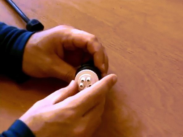 Push in the terminal using the white tool.