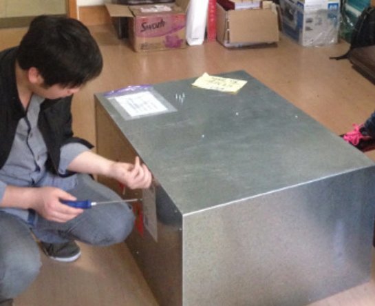 Open the container and inspect the monitor for damage.