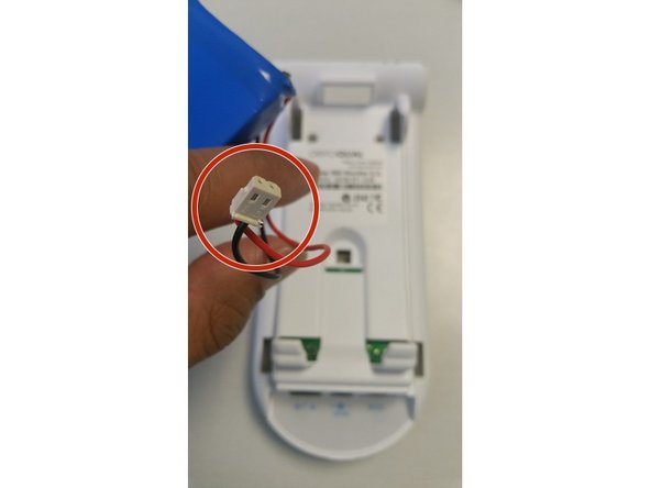 Insert the connector into the socket at the base of the monitor. Take care to orientate the plug and align the pins and press firmly into place.