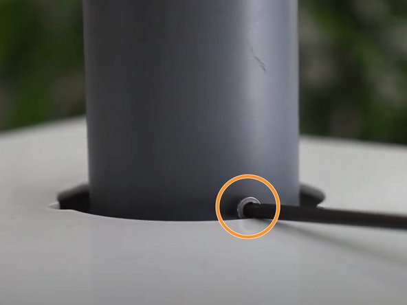 Remove the three retaining screws at the bottom of the PVC inlet tube using either an Allen key or small Philips head screwdriver (depending on the age of your instrument)