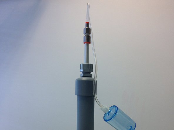 Remove the TSP head from the top of the particle inlet and attach the flow adaptor on your flow assembly.