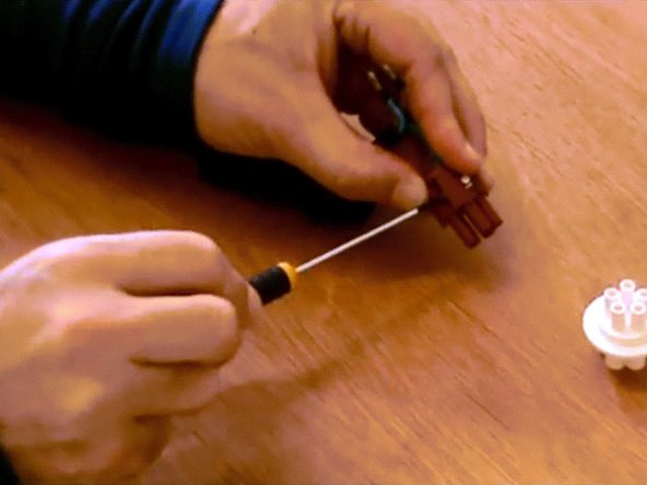 Loosen the screws in the terminal block.