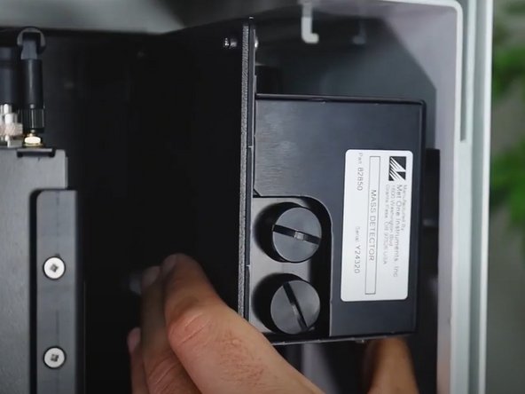 Loosen the 3 backplate screws so the module mount can be slide out. DO NOT remove these screws