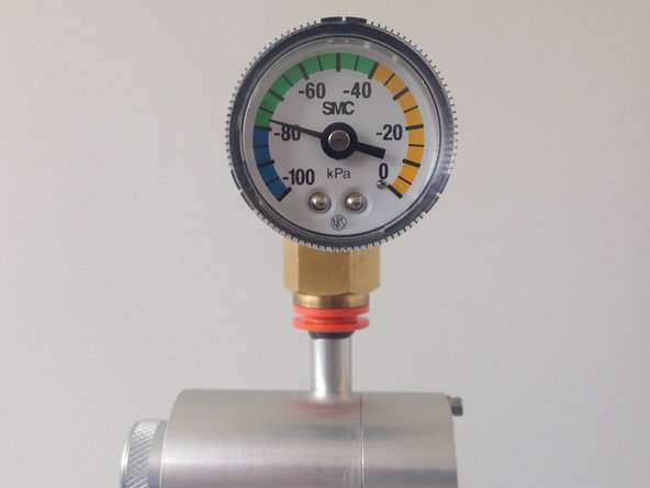 Remove the TSP inlet and place the vacuum gauge on the inlet.