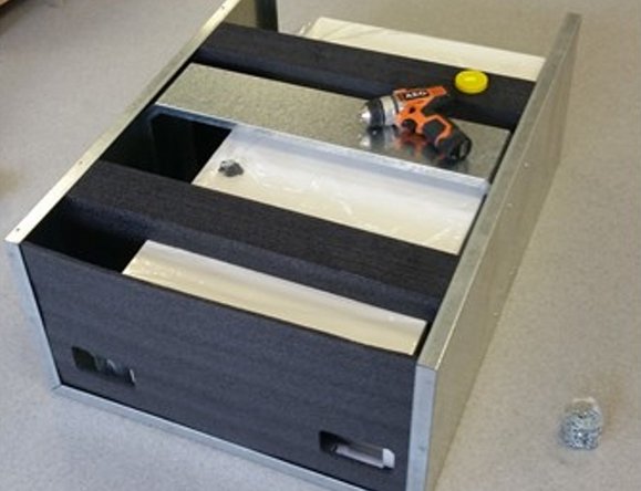 Insert the remaining cross-bracing pads to stabilize the packing and prevent movement during transport.