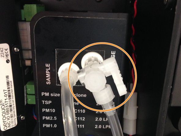 To adjust the flow on older monitors, fully close the purge valve by pushing the valve handle towards the pump module. Adjust the sample flow valve, located at the bottom of the enclosure under the PDI cover,  until the flow reads 2.2 LPM.  Then slowly re-open the purge valve until the flow reads 2.0 LPM ± 0.05  (between 1.95 and 2.05 LPM).