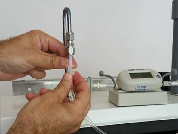 Measure and record the gas inlet flow rate.