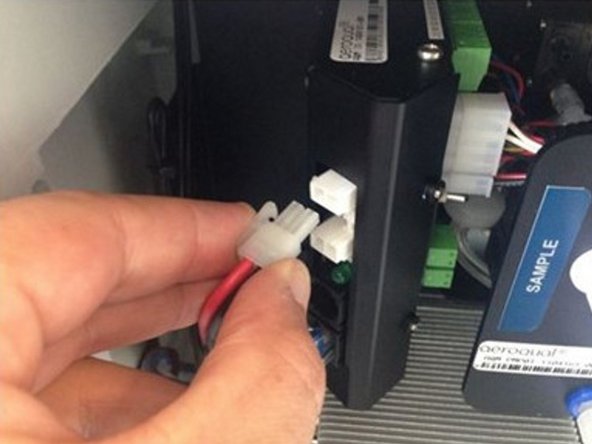 Stop the sample pump by pulling out the black and red power cable from the electronics module.