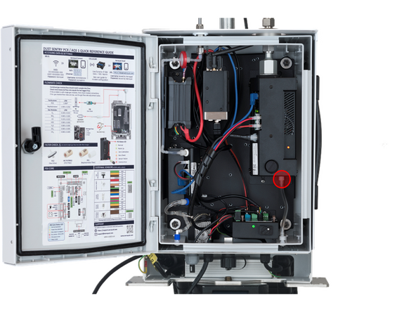 Disconnect the tubing from the fitting on the bottom of the PCX module by rotating the Luer fitting counterclockwise.