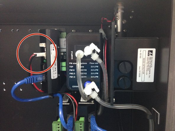 Stop the the sample and purge pumps by pulling out the black and red power cables from the electronics module.