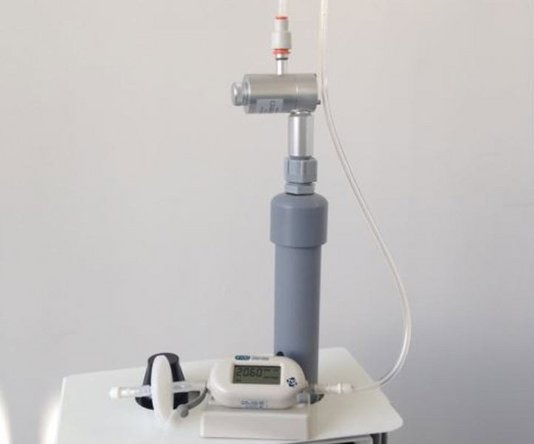 Attach the flow assembly to a 0-2.5 LPM volumetric flow meter.