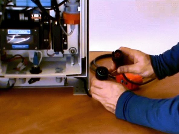 Identify the notch in the plug hardwired to the monitor and align the two plugs.