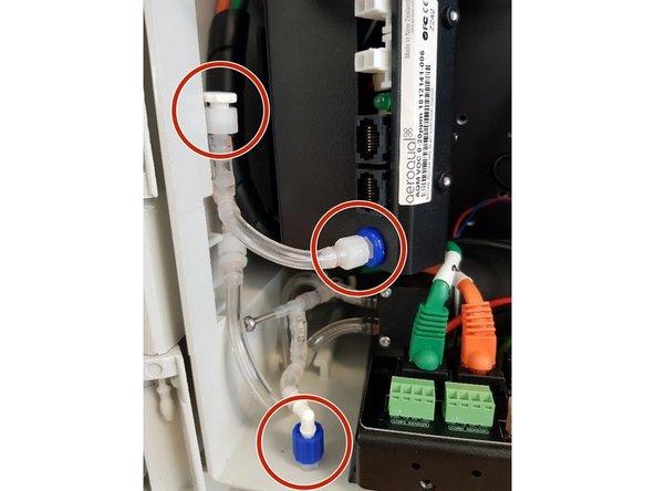 Re-connect the gas module exhaust assembly, ensuring that there are no kinks in the tubing. Ensure that all unused connectors are plugged. Ensure that the inlets to all gas modules are also connected.