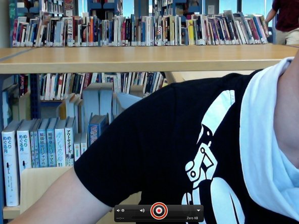 You should notice that a screen appears with a video of yourself or whatever the camera is facing. Select the 'record button' which is circled to begin the video