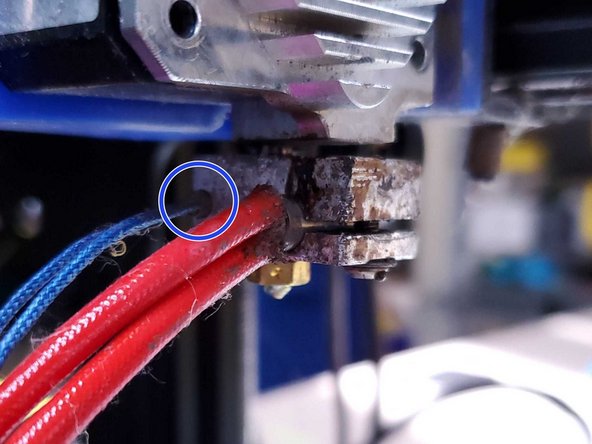 Heat the block either using the cartridge or a soldering iron