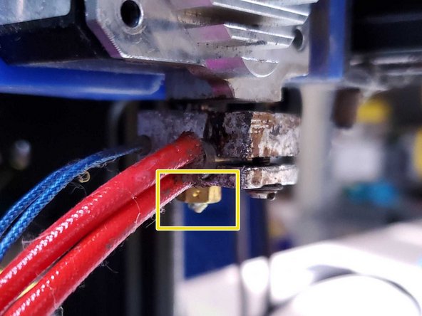 Heat the nozzle up to normal print temperatures