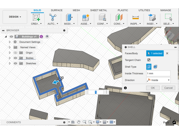 To do this, view your buildings from the bottom, then right click the bottom layer of the building you want to shell, then press the shell button from the dropdown menu, and enter your desired inside thickness. Be sure the direction is set to inside.