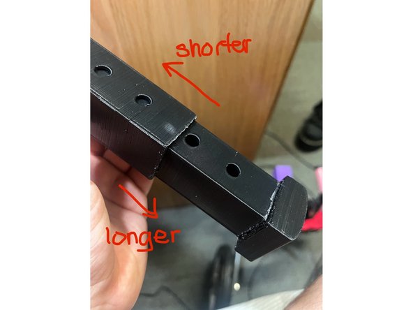 Move the inner leg inside the outer leg until the desired length is achieved. Place the pin through the hole in the inner leg to secure it in place.