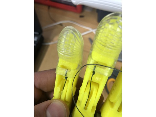 Take the Gel Grip Fingertips from the Phoenix assembly kit, and put them on each finger (all same size, all will fit).