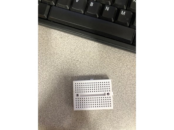 Breadboards are arranged like in the picture. Note the connections like demonstrated in the picture. They are organized in columns when it is set  up long ways horizontally, and don't cross over the gap in between.