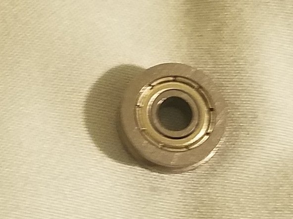 Filament bearing shim