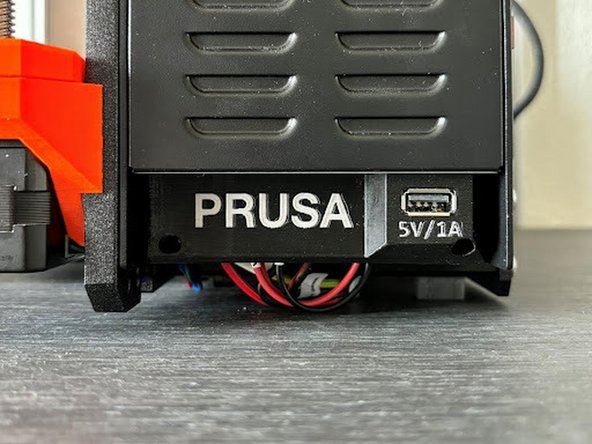 Export the STL file onto the USB, and make sure to extract the file before taking out the USB.  Plug the USB into the Prusa Mini printer and begin the printing process.