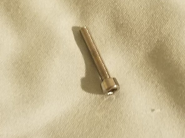 Extruder base and idler arm