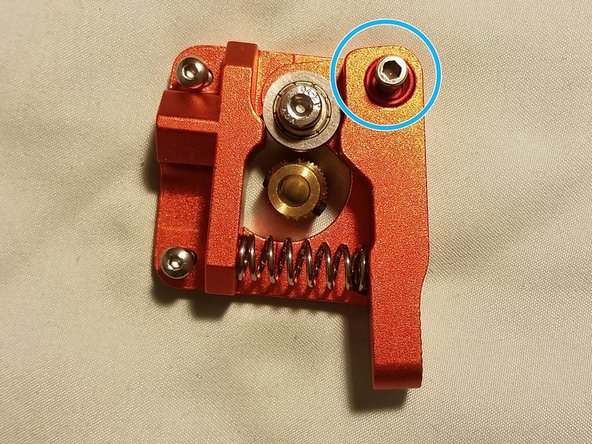 Your two hex rounded hex screws should be on the bowden side of the frame, with your countersunk screw going in the bottom right corner.