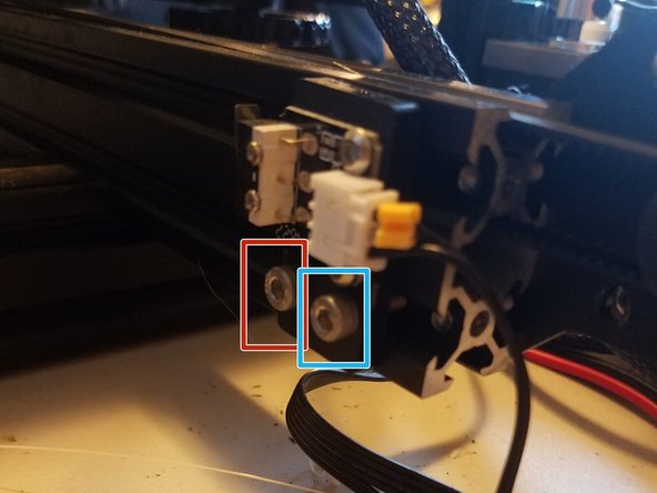 Undo the two screws holding the Y axis end stop in place