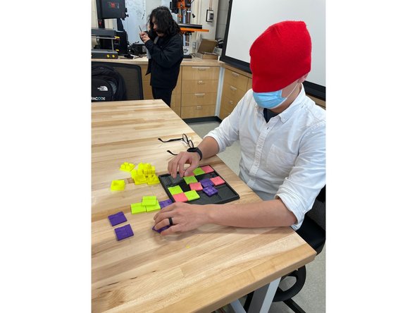 The opposing player should match the pieces by touch only. The player that assembled the base layout will time them to see how fast their opponent can finish the puzzle.