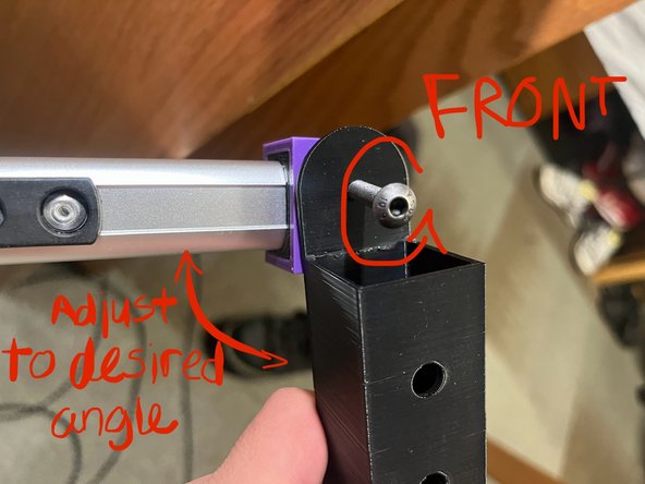 Adjust the angle as needed until the desired height above the ground is reached. Then, place the nut on the outer box hole on the side closer to the center of the wheelchair and place the screw through the hole in the nut. Finally, tighten the nut until the outer leg is securely in place.