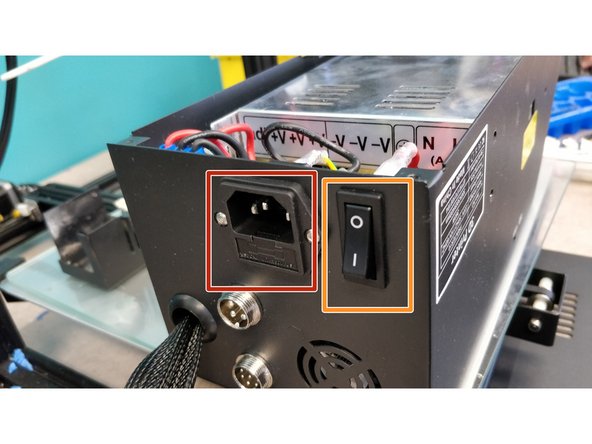 Plug the printer into a wall outlet and unplug it from USB.