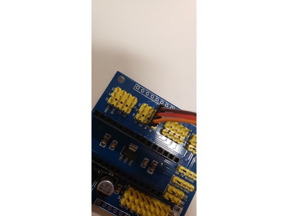 Servos have three cables bundled into three joined female pinheads. These three cables are ground, which is brown or black, power, which is red, and signal, which is orange