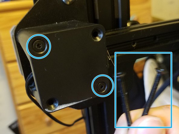 You'll have two extra long screws that you should put away.