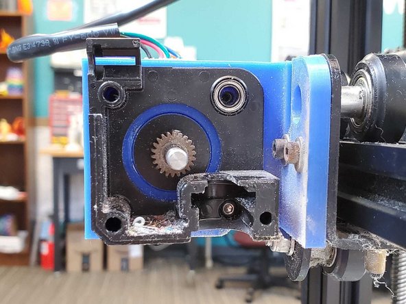 Contains a length of PTFE tube to help guide the filament down