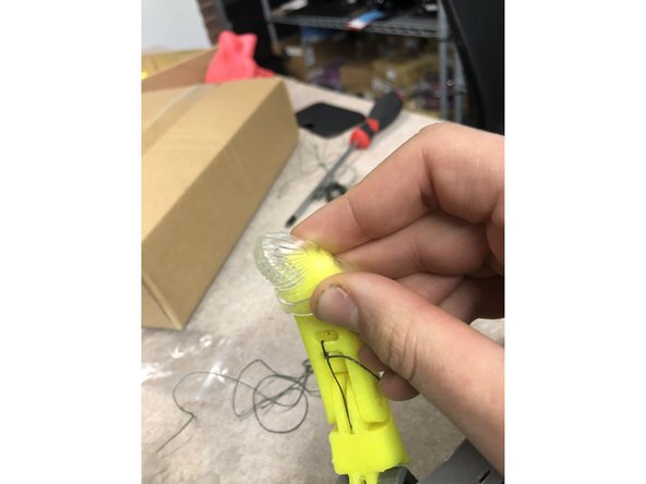 Take the Gel Grip Fingertips from the Phoenix assembly kit, and put them on each finger (all same size, all will fit).