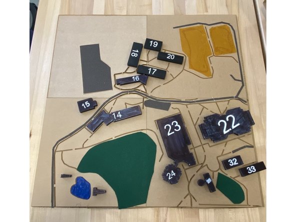 Cut out each texture to appropriately match the shape of what it is representing on your map