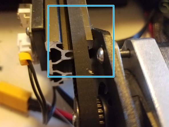 Push the build plate back and forth a couple of times to make sure the belt will run smoothly in the middle of the gear and won’t touch the bar it runs through.