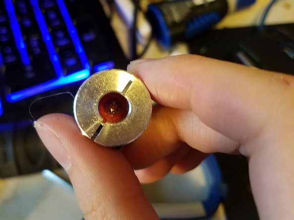 The new adaptor has a large hole end and and a smaller end.