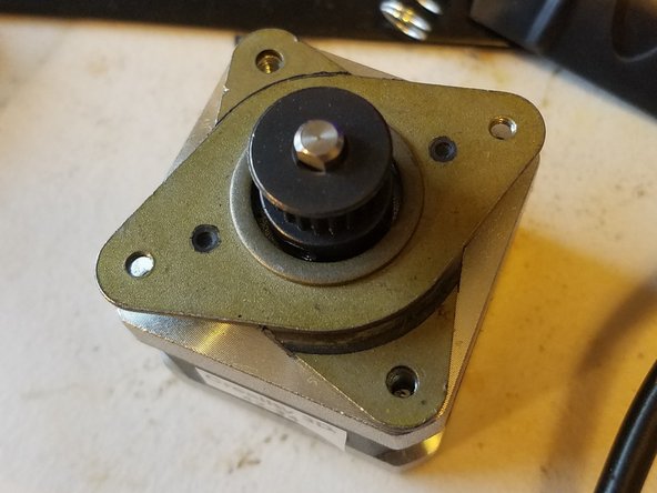 Same as last time, place the damper on the motor so that the raised side faces up.