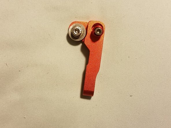 Note: The filament bearing screw will need to be screwed in, but the Idler hinge screw can just sit loosely for now