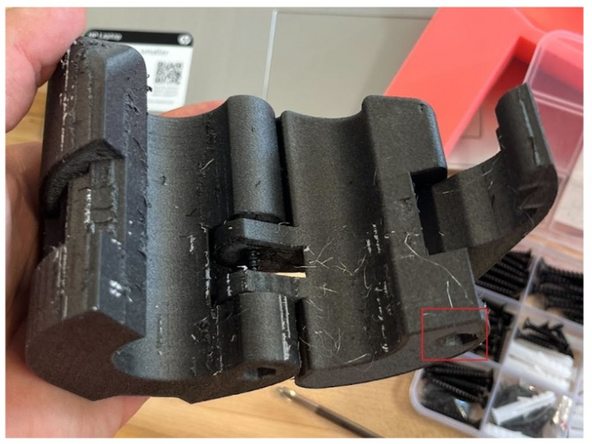 Then, take this now connected base/joint piece and screw in the lock piece into the joint piece using an M5 x 40 screw at the location shown in the image.