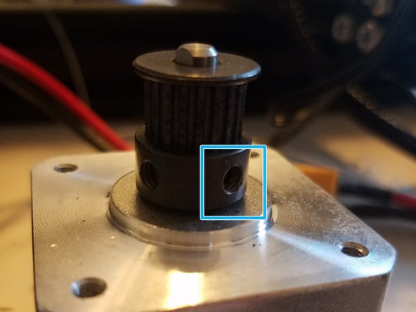 Loosen this grub screw on the stepper just enough so that the gear can be smoothly moved up and down by hand. There may be a second grub screw set at about 90 degrees from the first one, loosen that one too