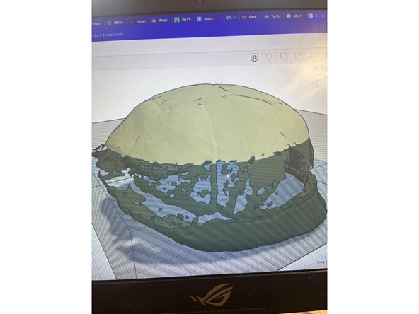 The first is filling in the rough structure with an assortment of polygons, like partial spheres, in order to fill the broken shell.