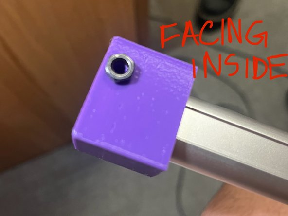 Adjust the angle as needed until the desired height above the ground is reached. Then, place the nut on the outer box hole on the side closer to the center of the wheelchair and place the screw through the hole in the nut. Finally, tighten the nut until the outer leg is securely in place.